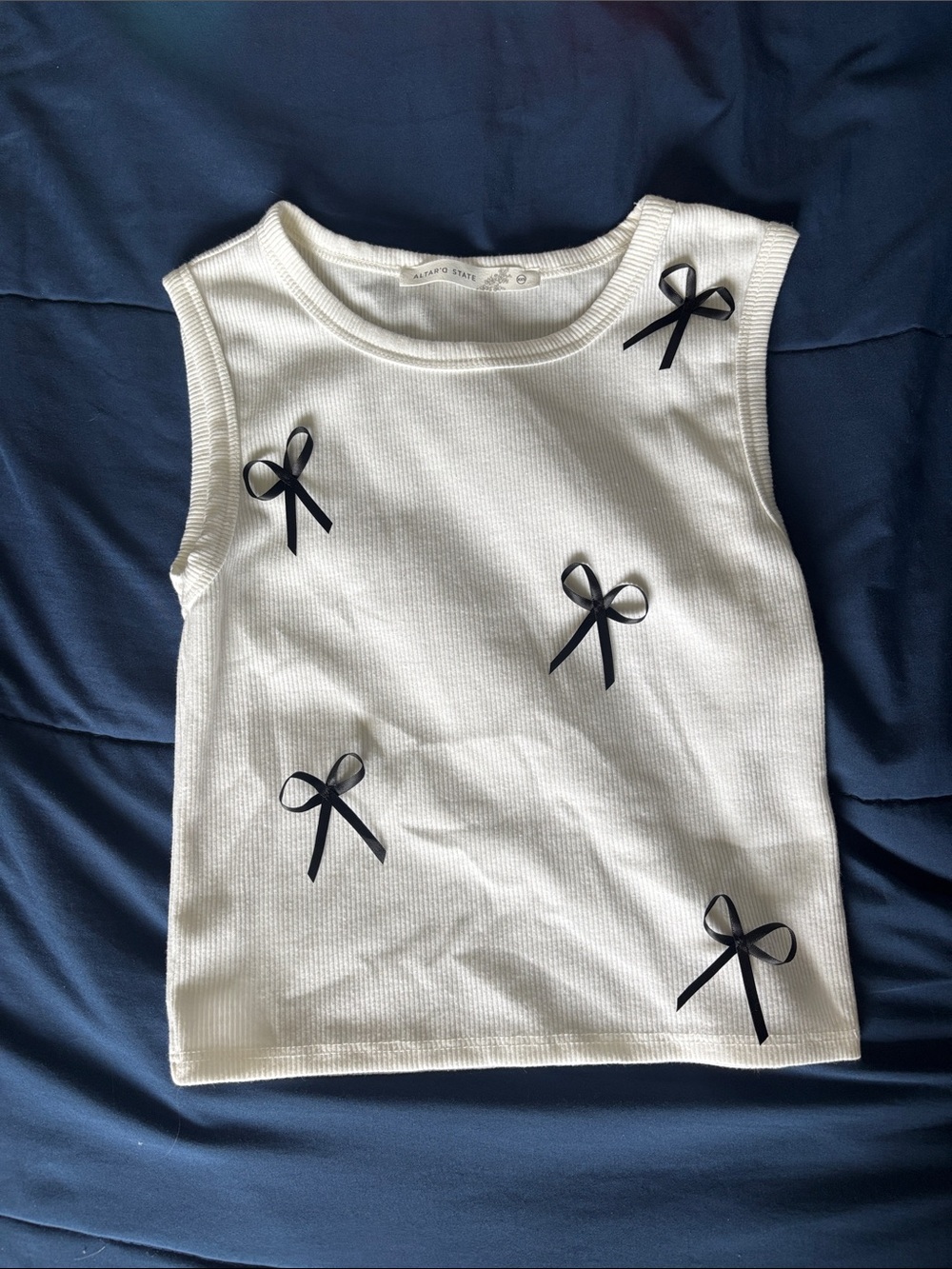White tank with black bows